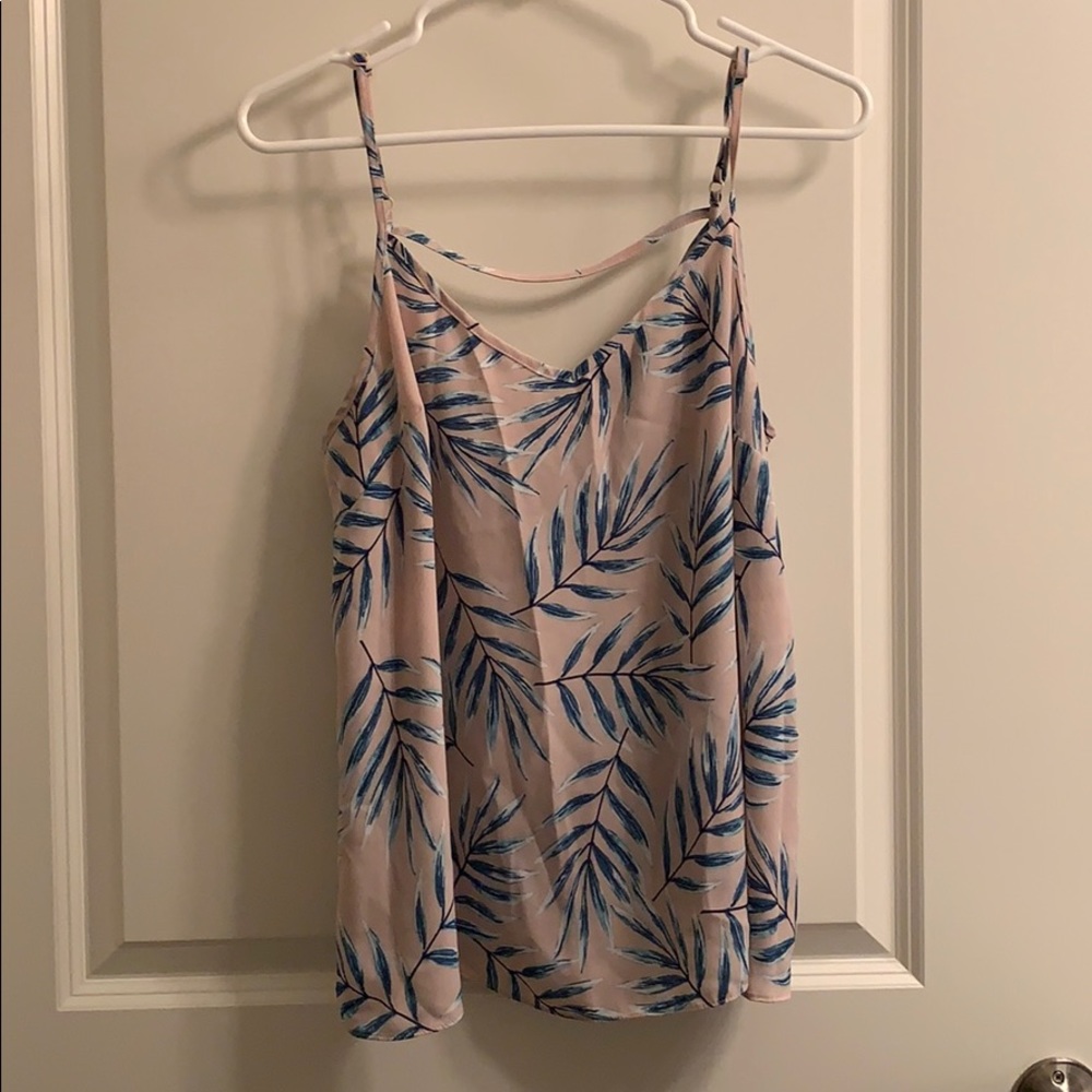 Pink floral sleeveless blouse